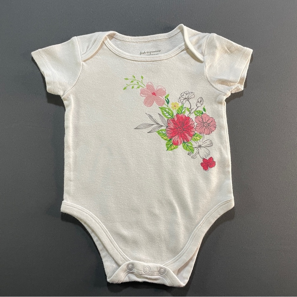 First Impressions Cream Bodysuit with Pink Floral Design